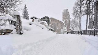 El campanario de la torre de Sant'Agostino cubierto de nieve - Autor: GRILLOTTI, Emiliano / EFE